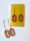 Dangle earring, scarlet and gold acrylic, lace pattern, gold plated brass bar attachment - 8cm x 2cm x 0.6cn