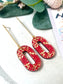Dangle earring, scarlet and gold acrylic, lace pattern, gold plated brass bar attachment - 8cm x 2cm x 0.6cn